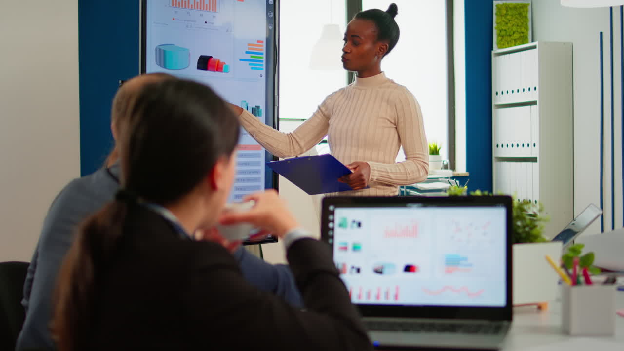 African entrepreneur making project presentation during brainstorming