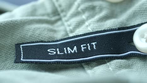 close-up of a slim fit clothing tag