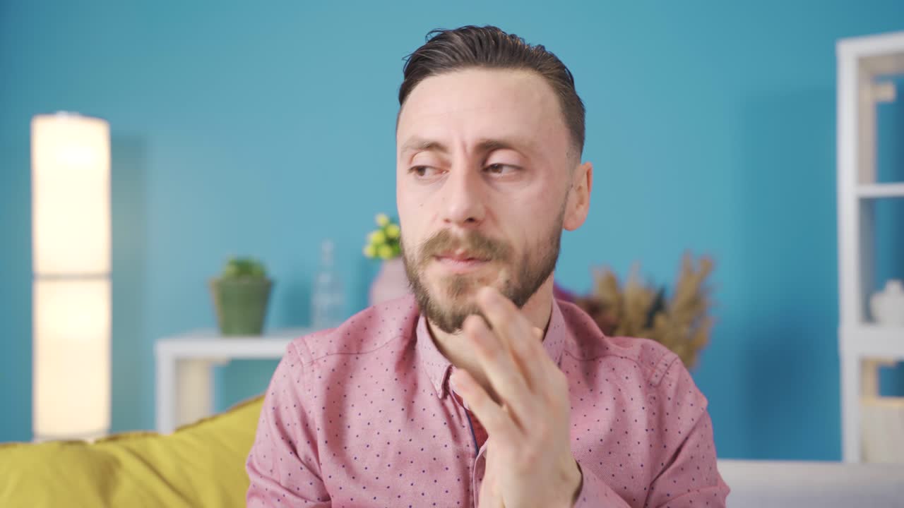 Stressed man is worried and can't think confused.