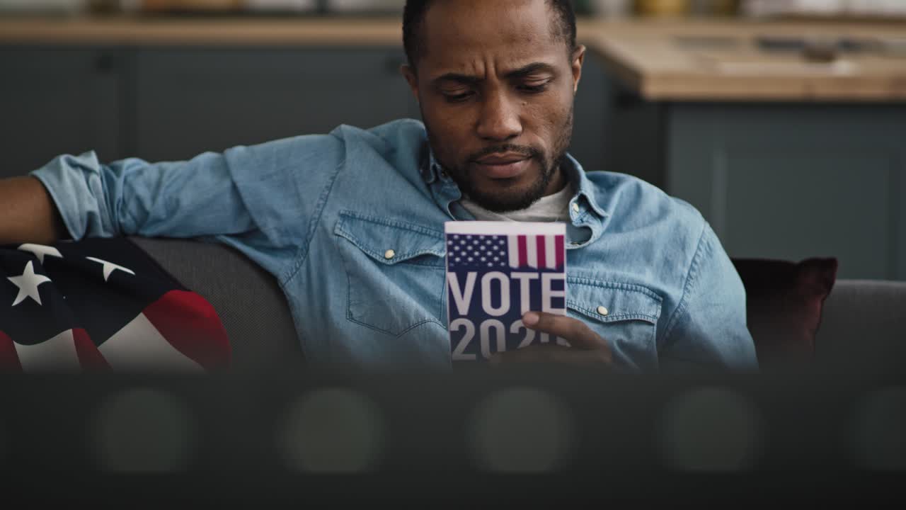 Video of man browsing informational leaflet