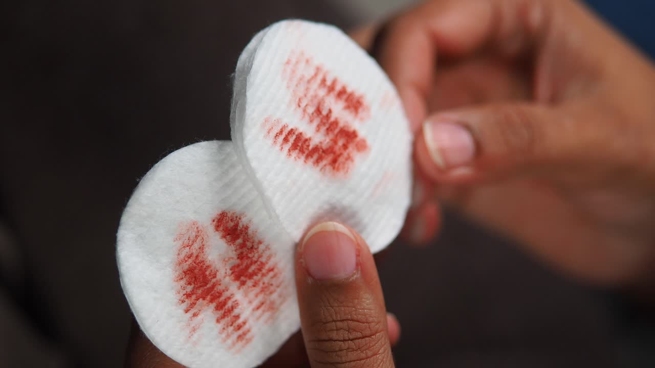Cotton Pads with Red Residue