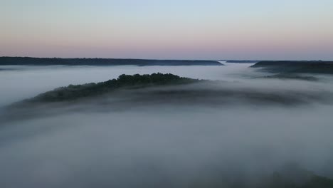 misty valley sunrise