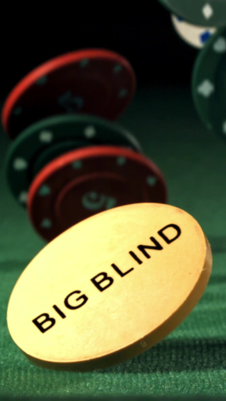 Slow Motion Big Blind Poker Chip Spinning on Green Table