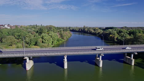 traffic on the bridge that crosses the river