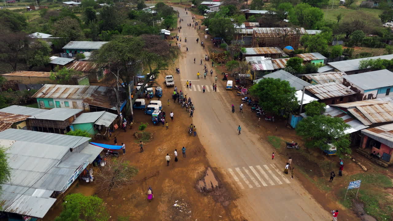 People gathering in Kako’s tribal market - aerial view