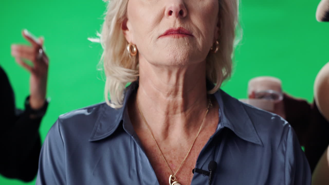 Woman getting makeup and styling done