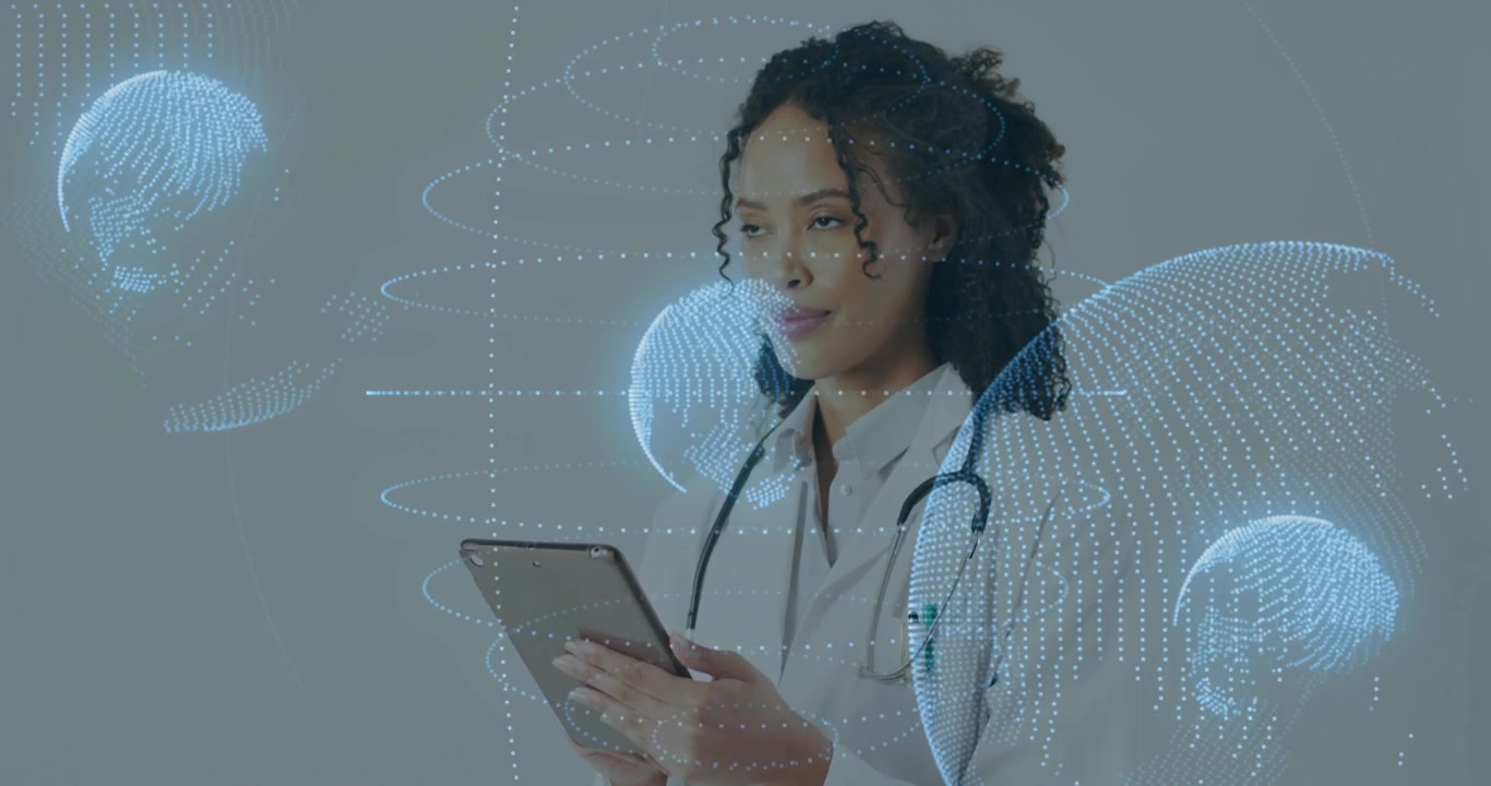 Doctor holding tablet tapping and causing blue data globes wrapping around torso for review