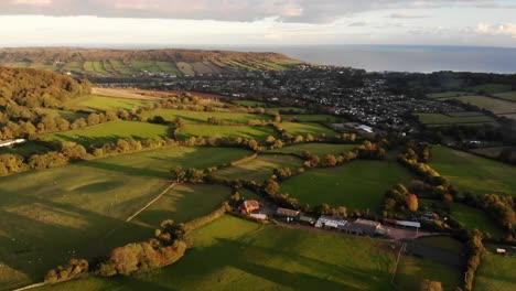 aerial view of countryside fields and farmland on the coast of devon in england