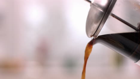 cafetiere pouring coffee