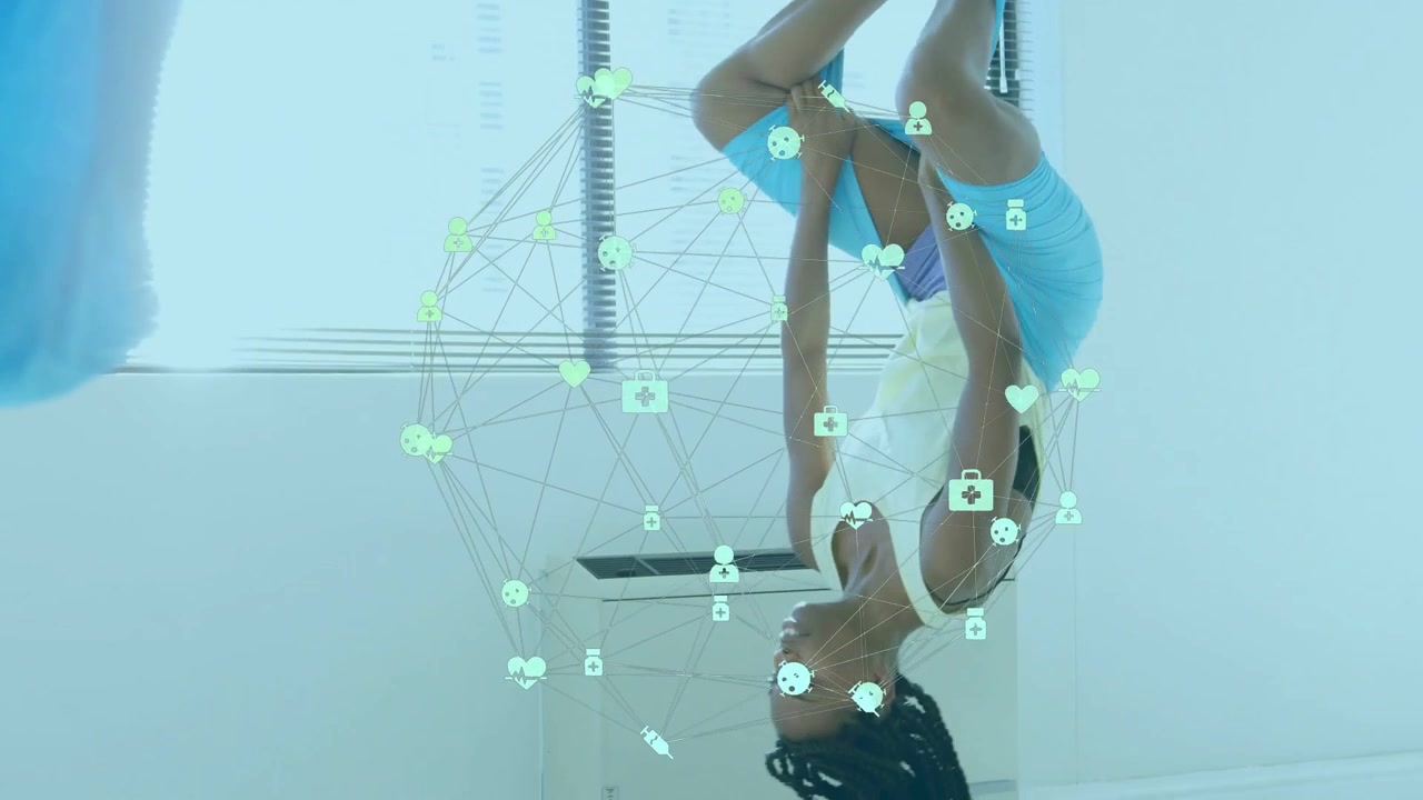 Vertical video: Appearing holo icons initiating woman in tanktop shorts moving low into crouch, mat