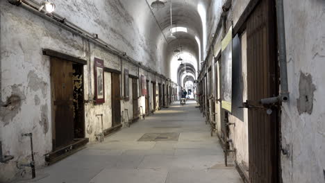 prison cell block at eastern state penitentiary from right side of aisle