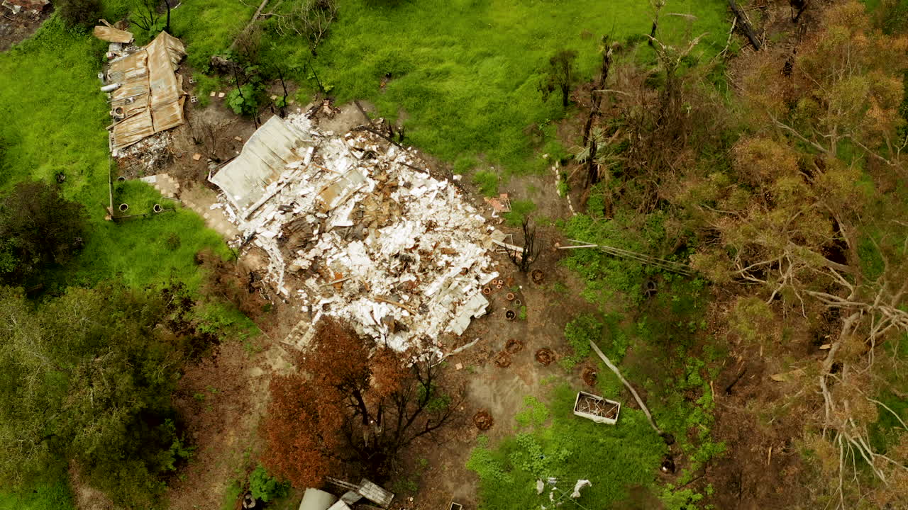 Aerial View of a Burnt House After a Bushfire