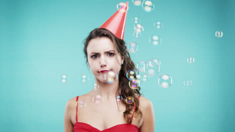 Crazy-face-silly-woman-dancing-in-bubble-shower-slow-motion-photo-booth-blue-background