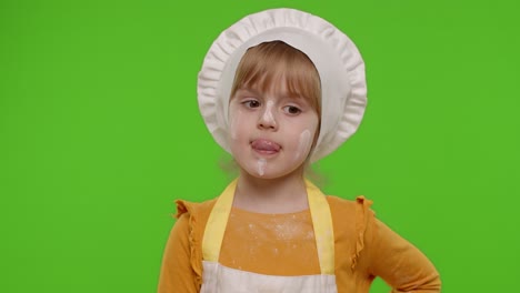 Niña-Graciosa-Vestida-De-Cocinero-Panadero-Con-Delantal-Y-Sombrero-Bailando,-Bromeando,-Haciendo-Muecas