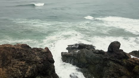 port macquarie, australia - ocean waves crashing on the rocks - wide shot