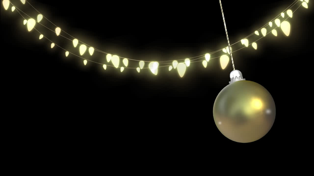 animación de la joya de navidad colgando sobre las luces de hadas en fondo negro.