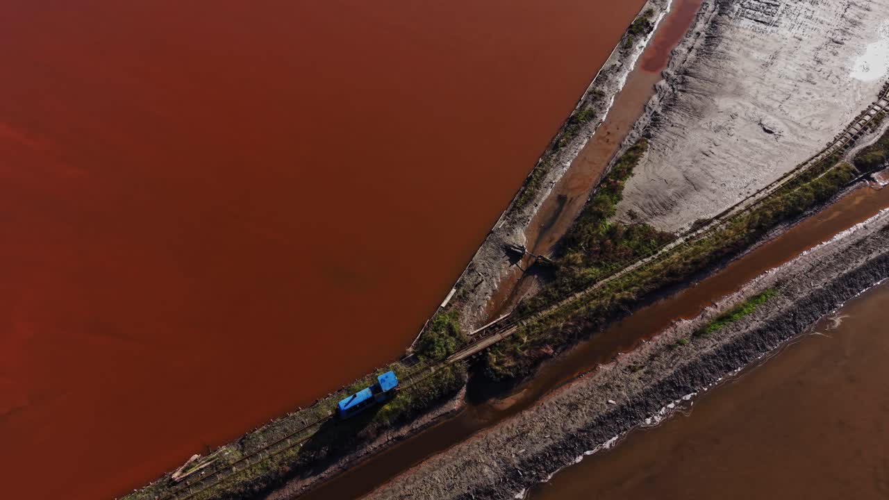 Salt production area with drying salt flats and water channels