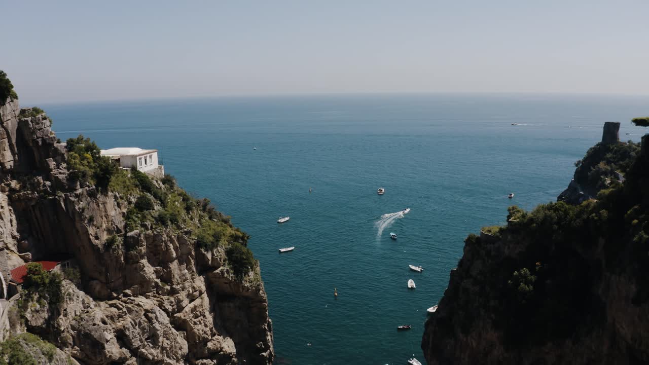 Drone shot flying through Italy's unique seaside to reveal the Tyrrhenian Sea