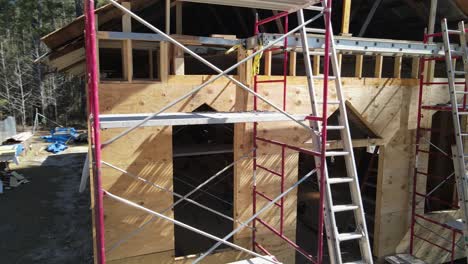 wooden church being repaired plywood cladding