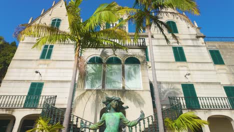 skipping girl sculpture in front of old monte palace residence