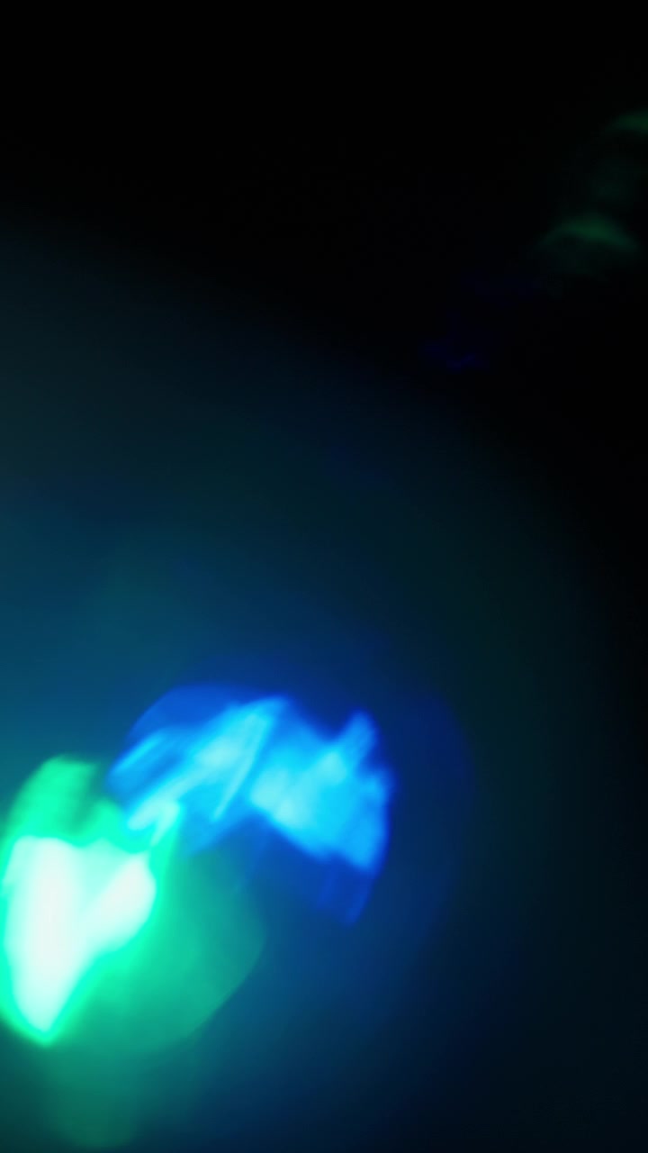 Pack of abstract light leaks created from glass prism reflection