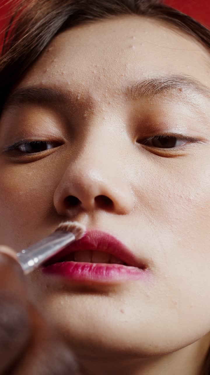 Makeup application on a woman's face