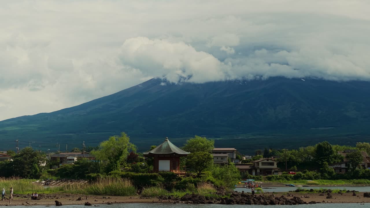 Scenic view of Mount Fuji with pagoda and lake
