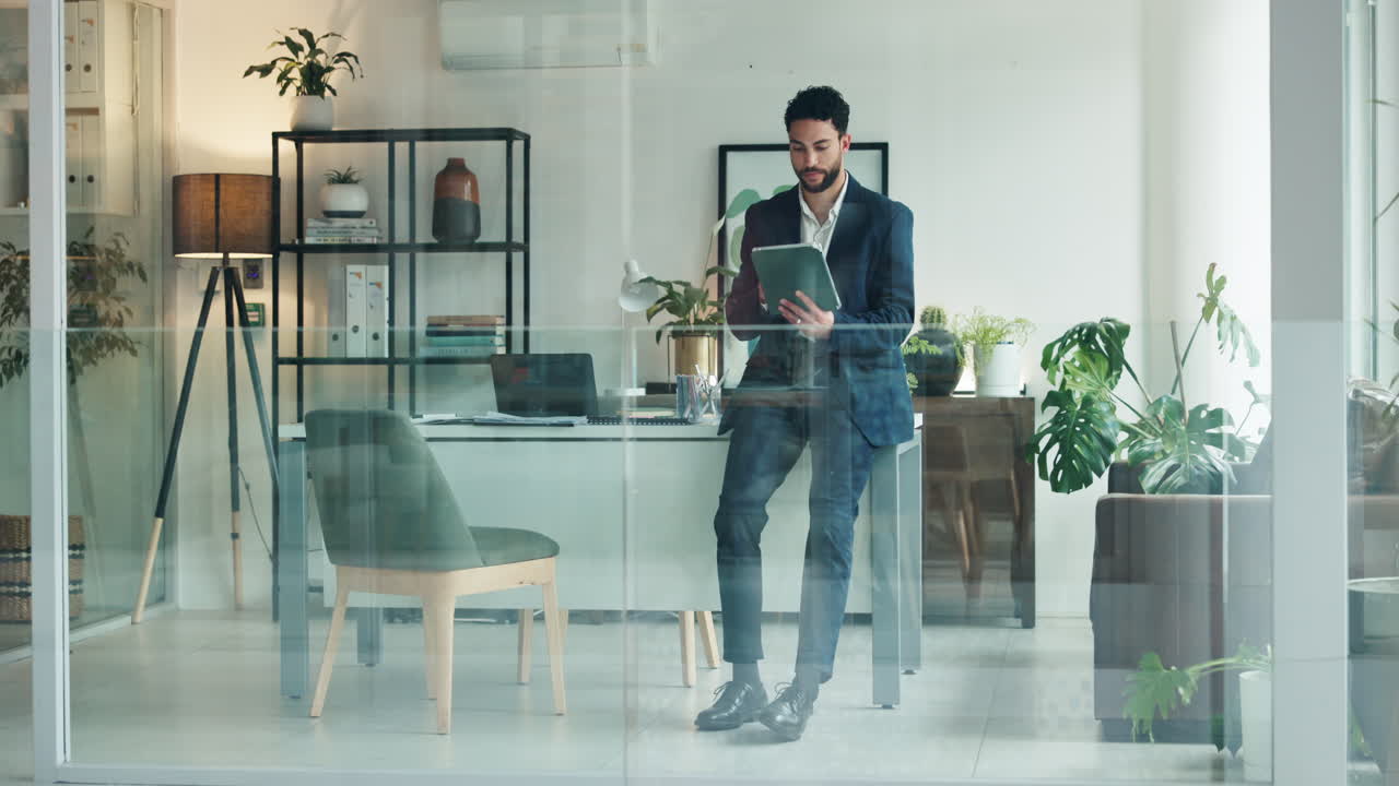 Man in Office Using Tablet