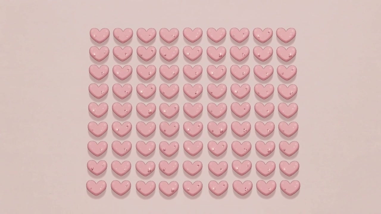 Zooming camera revealing square grid of glossy pink heart shapes on pale pink surface