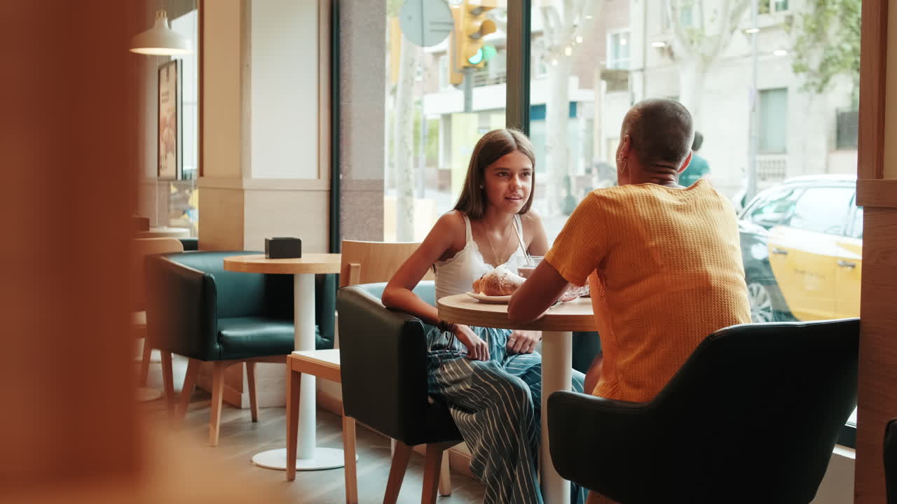 Women Talking in Cafe