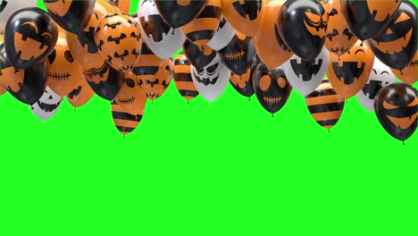 halloween balloons transition on a green background