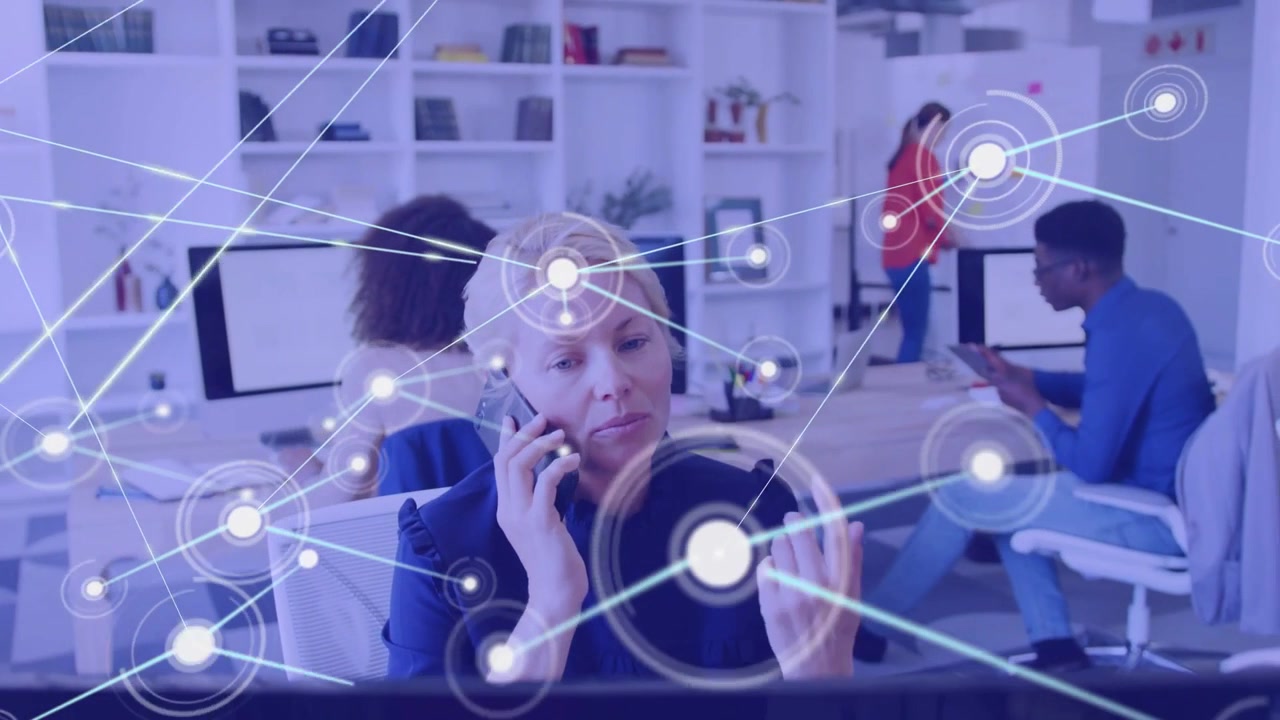 Woman calling on phone at desk, node appearing over face and network spreading, showing tech data