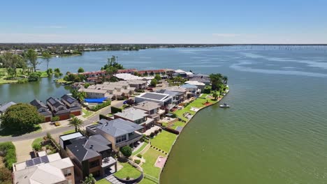 overhead alongside resort houses and apartments on the shore of lake mulwala in nsw, australia