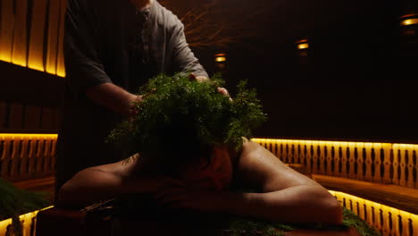 herbal head massage in a sauna