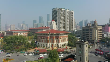 sunny day flight over changsha city center traffic street circle aerial panorama 4k china