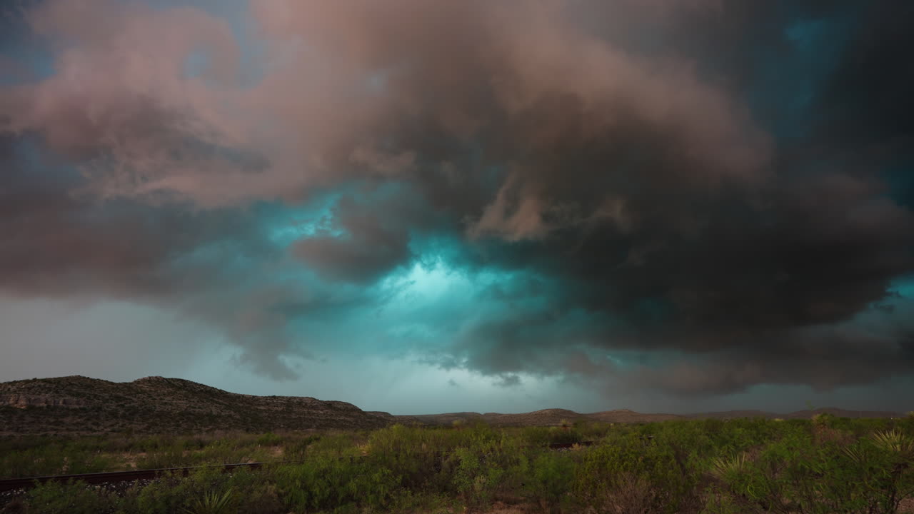 Powerful Supercell Forming in Fast Motion Over Wide Open Prairie Horizon