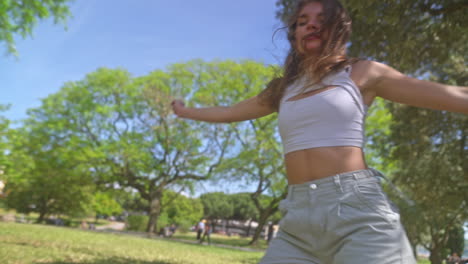woman dancing in a park