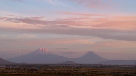 agri ararat mountain turkey armenia iran border snow capped high altitude in twilight pink sky blue clods in horizon after sunset before sunrise natural landscape of beautiful wonderful scenic shot