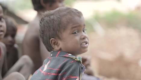 portrait of a young child in a community setting