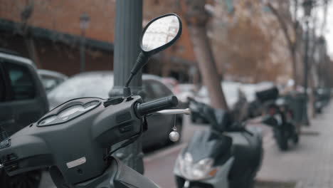 scooter with christmas ball in city street