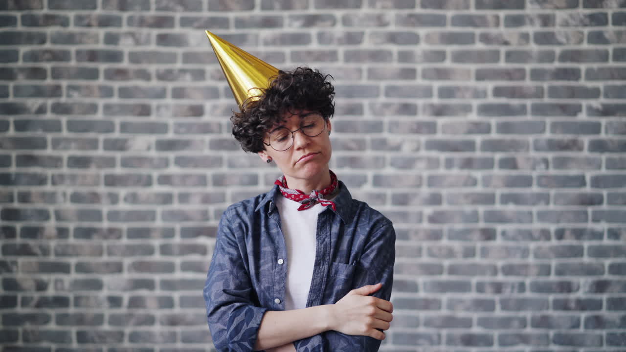 Woman with Party Hat Looking Discontented
