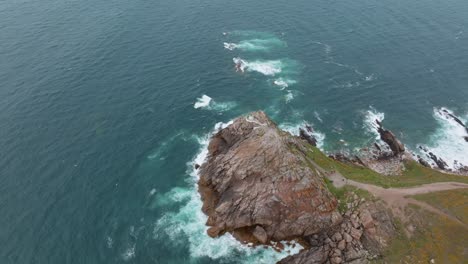 Orbit-Shot-Of-Unique-Punta-Lameda-Lighthouse-At-Mirador-de-Monteferro,-Vigo,-Galicia,-Spain