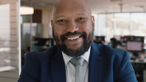 portrait african american businessman smiling confident manager in corporate office attractive male executive enjoying successful career in business management professional at work