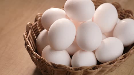 white eggs in a basket