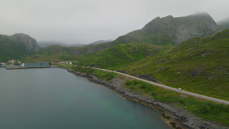 Campervan-Driving-On-The-Road-Mountains-In-Islendingen,-Lofoten-Islands,-Norway