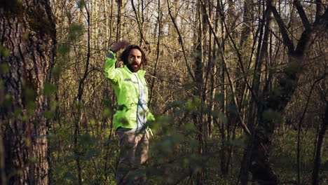 rescue squad leader guiding route through the woods to collect evidence