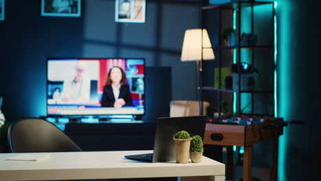 Work-desk-in-neon-lit-home-interior