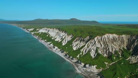 coastal cliffs and lush vegetation of an island