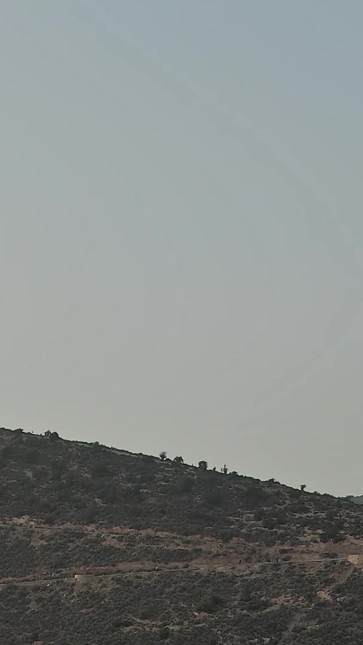 Aerial view of hills and landscape in Morocco during clear weather