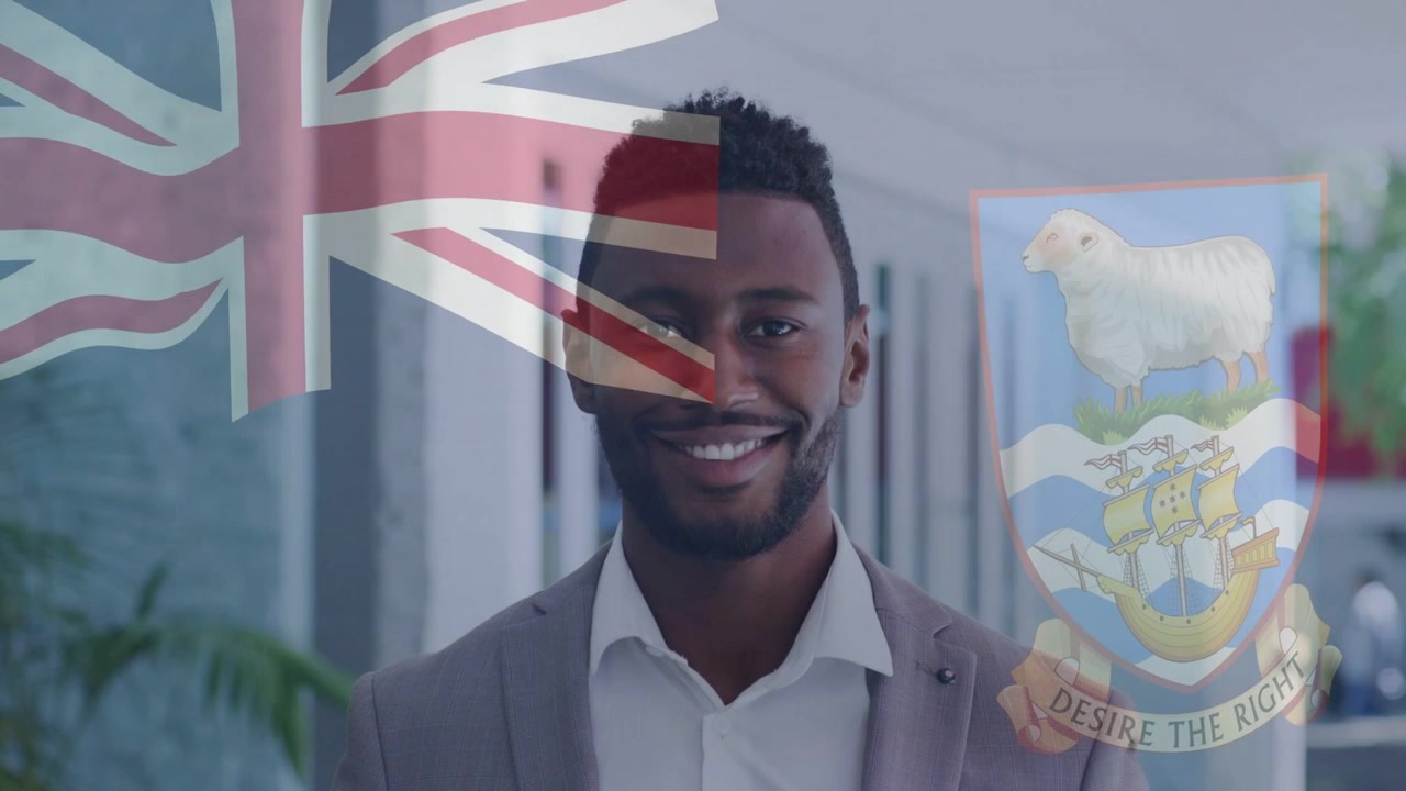 Businessman standing, flags overlaying, smiling as overlay animation starting and signaling welcome